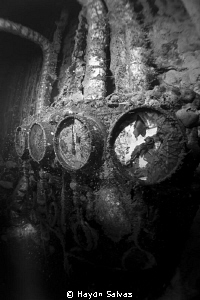 Inside the engine room of the Heian Maru in Truk, lots of... by Haydn Salvas 